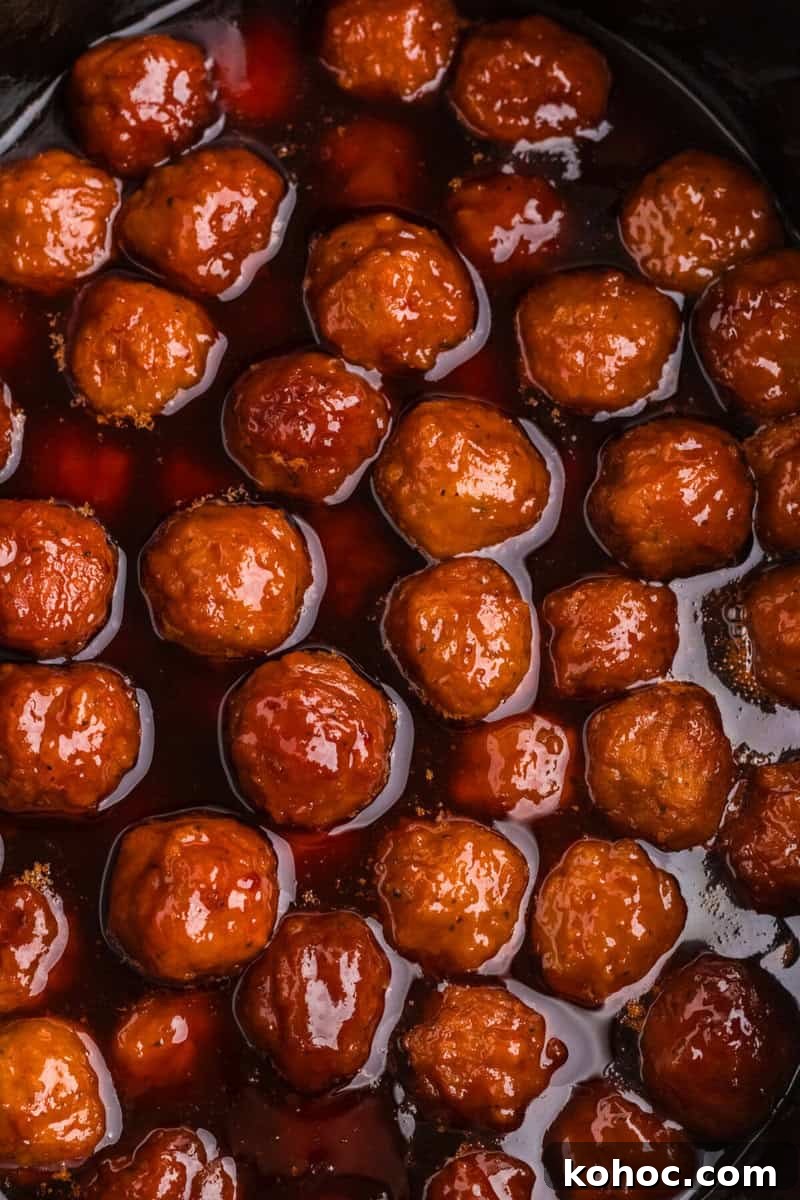 Quick 3-Ingredient Meatball Recipe for Busy Weeknights 2 top-down view of the meatballs in the slow cooker.