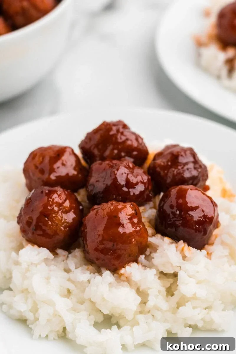 Quick 3-Ingredient Meatball Recipe for Busy Weeknights 8 3 Ingredient Meatballs served on top of rice.
