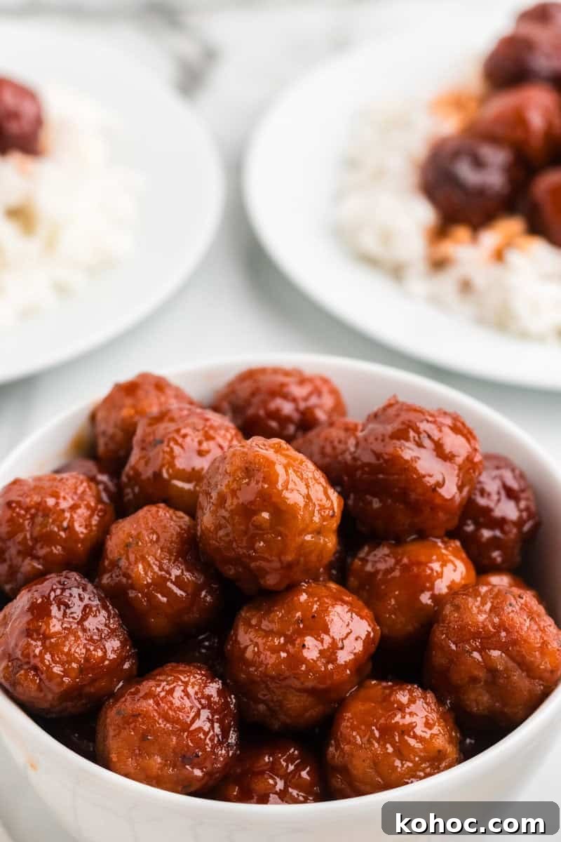 Quick 3-Ingredient Meatball Recipe for Busy Weeknights 9 closeup of 3 Ingredient Meatballs served in a white bowl.