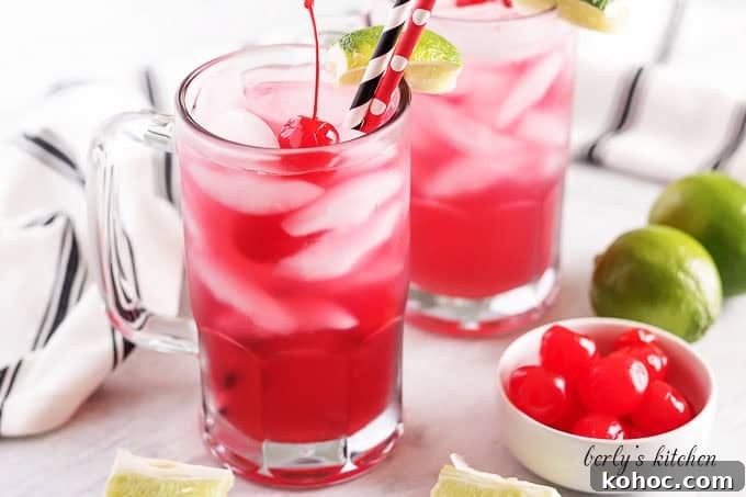 Cherry limeade in glass mugs.