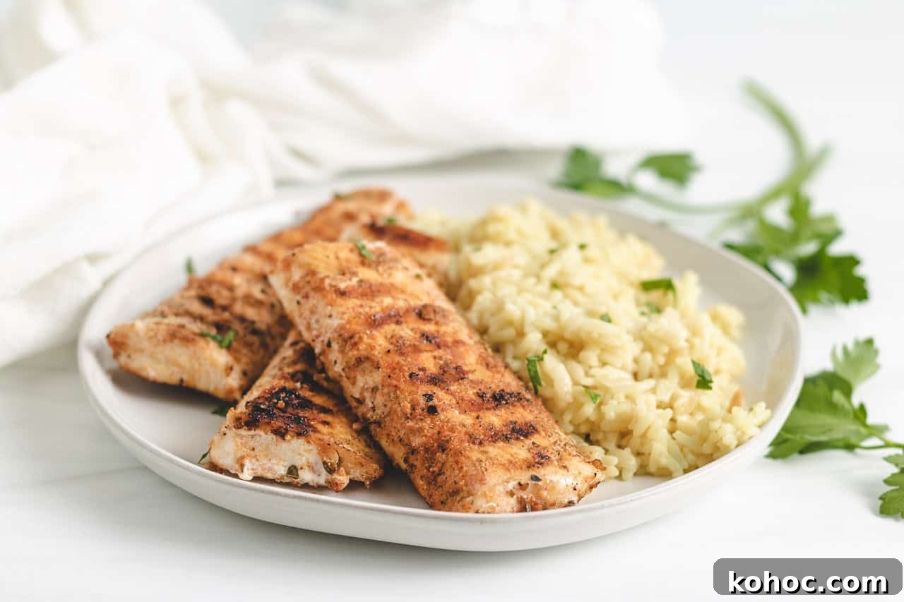 Pieces of grilled mahi mahi on a plate.