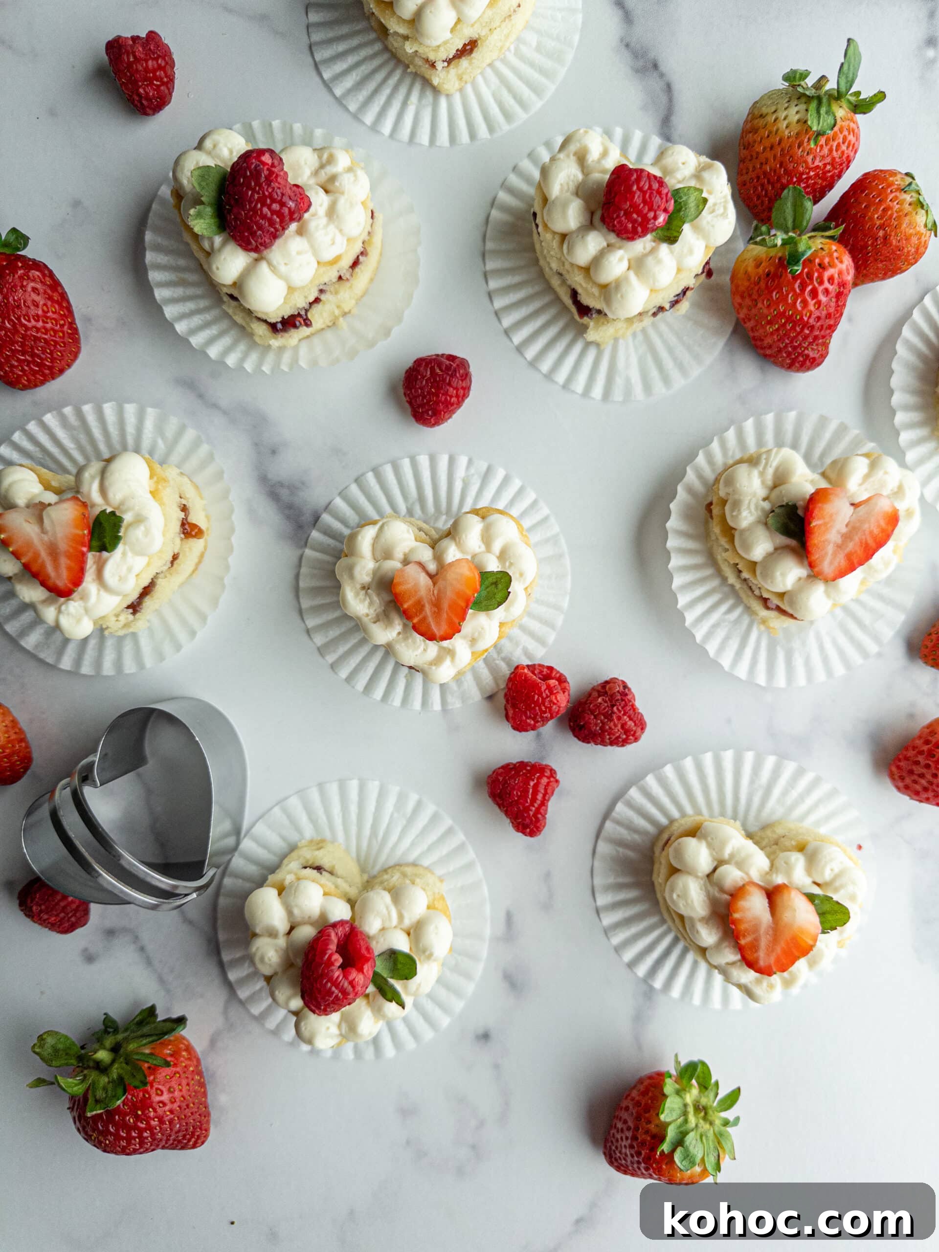 Mini Heart Cakes: Two Simple Ways to Make Adorable Treats 9 Mini heart cakes cut out with a heart biscuit cutter.