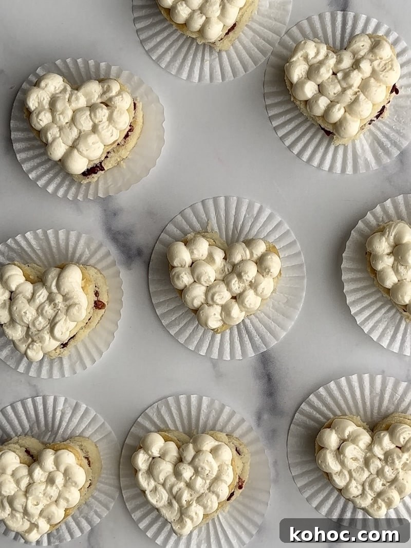 Mini Heart Cakes: Two Simple Ways to Make Adorable Treats 7 Mini heart cakes frosted with vanilla buttercream frosting.