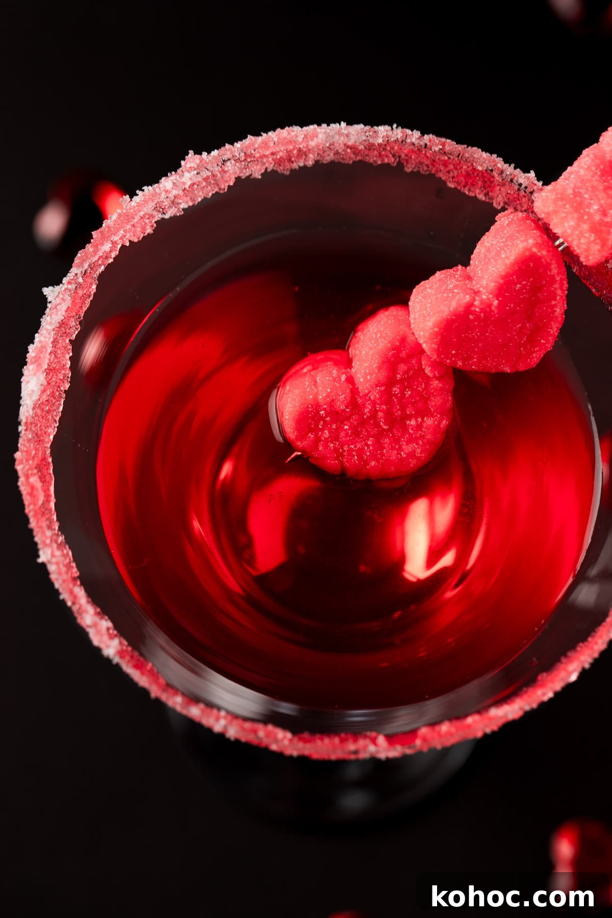 Romantic Love Potion Cocktail Recipe for Date Night 2 Overhead view of a love potion cocktail with a red sugar rim and marshmallow garnish.