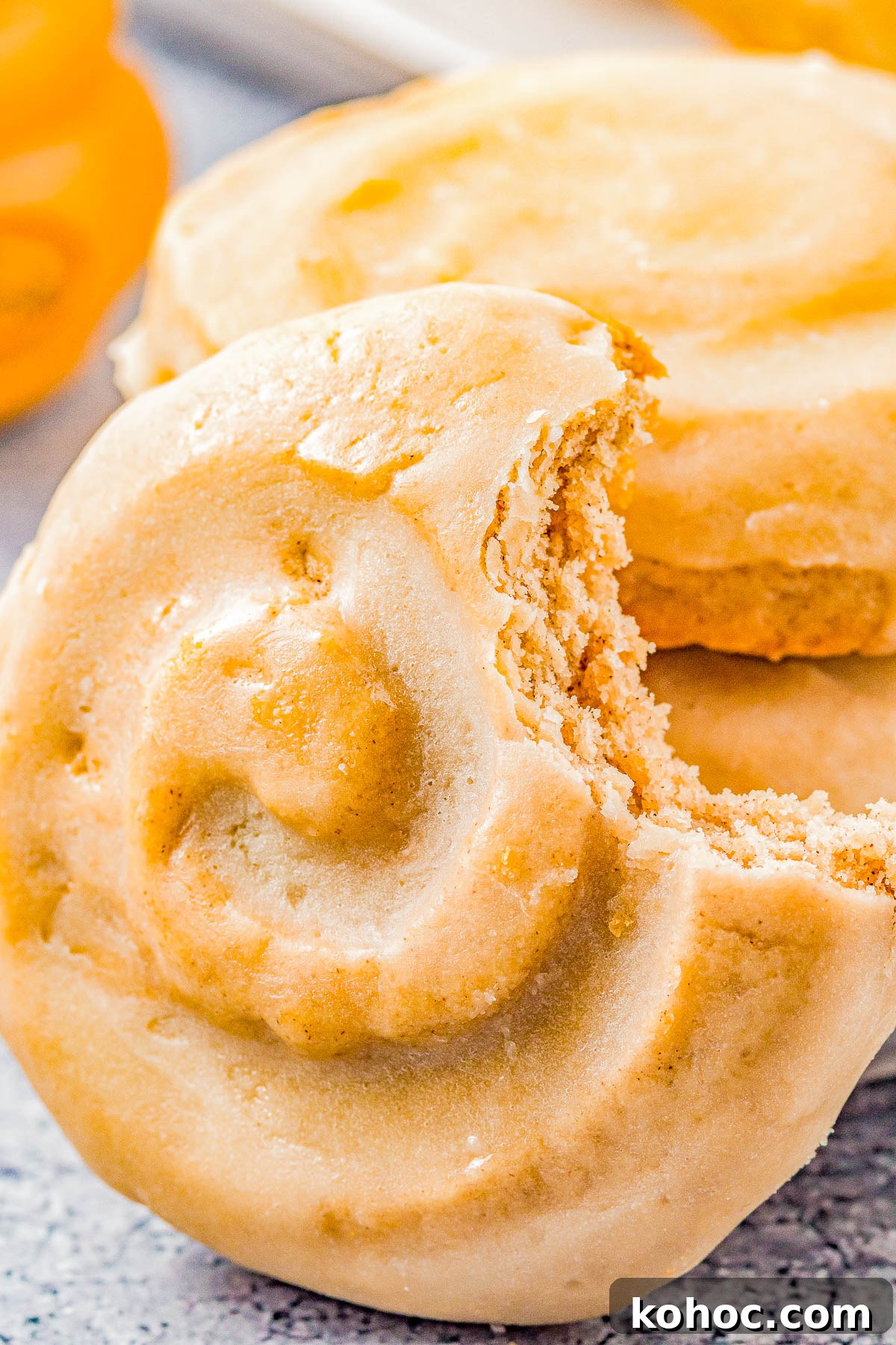 Honey Bun Cookies (Crumbl Cookies Copycat) - Soft and chewy with a warm buttery cinnamon flavor, these cookies resemble a classic Honey Bun with their fun swirl on top! The sweet honey glaze makes them IRRESISTIBLE! This EASY Crumbl Cookies copycat recipe will become a family FAVORITE! 