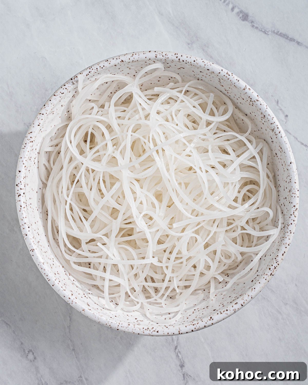 Perfect Rice Noodles: How to Cook Them Without Overcooking 15 Cooked fresh rice noodles in a bowl.