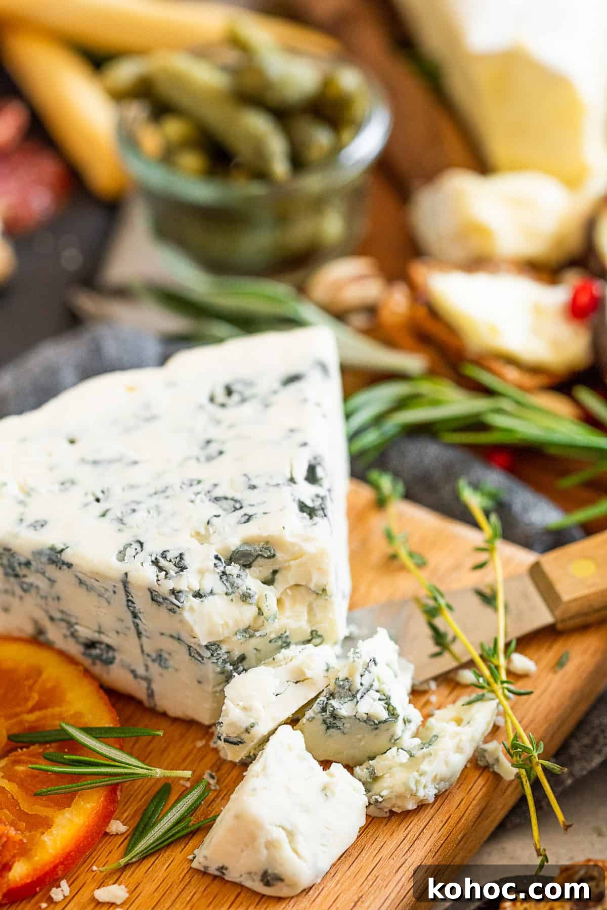 Autumn Cheese Board Ideas for Entertaining 5 Fall Cheese Board shot of a wedge of gorgonzola cheese.