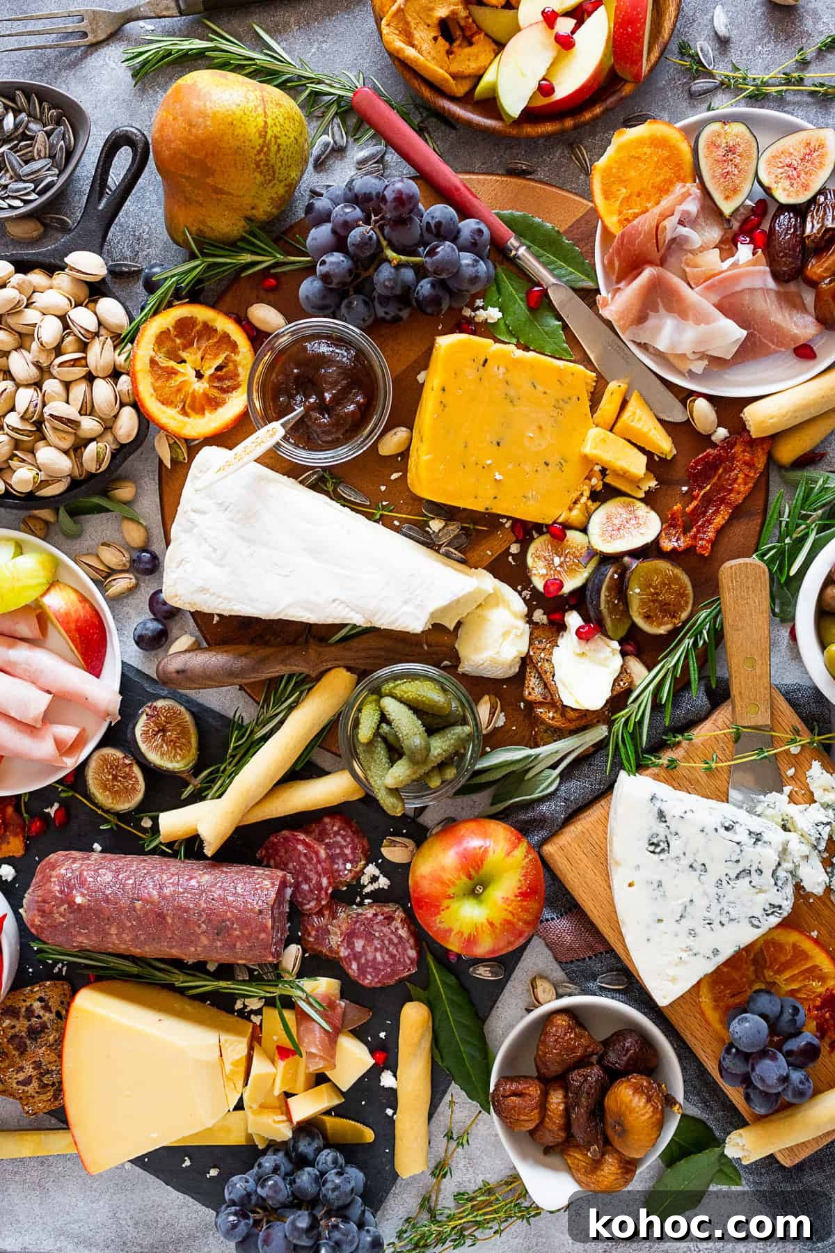 Autumn Cheese Board Ideas for Entertaining 6 Fall Cheese Board decorated with fresh herbs.