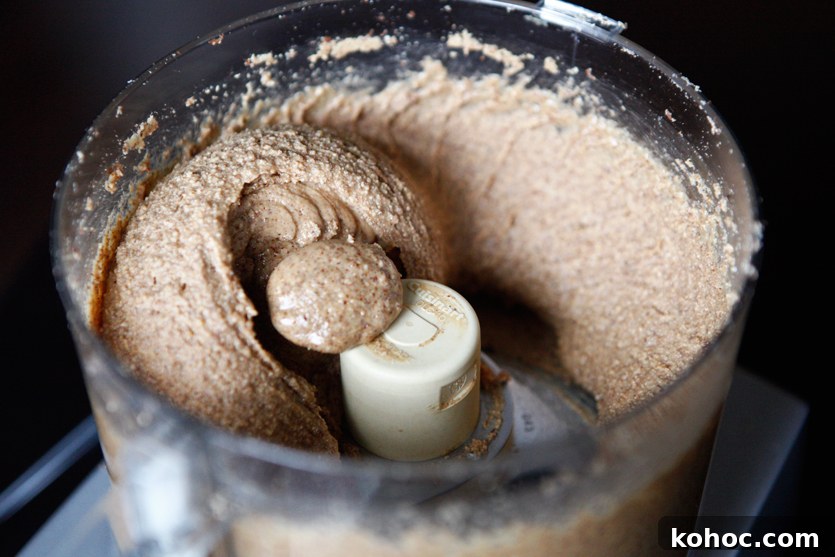 How to Make Creamy Homemade Almond Butter 7 Almond butter forming after several minutes