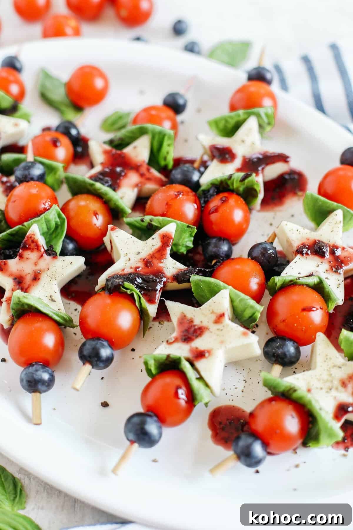 Blueberry Balsamic Glazed Caprese Skewers Recipe 2 These Caprese Skewers with Blueberry Balsamic Glaze are healthy, incredibly delicious and make the perfect festive appetizer for Memorial Day, 4th of July or Labor Day weekend!