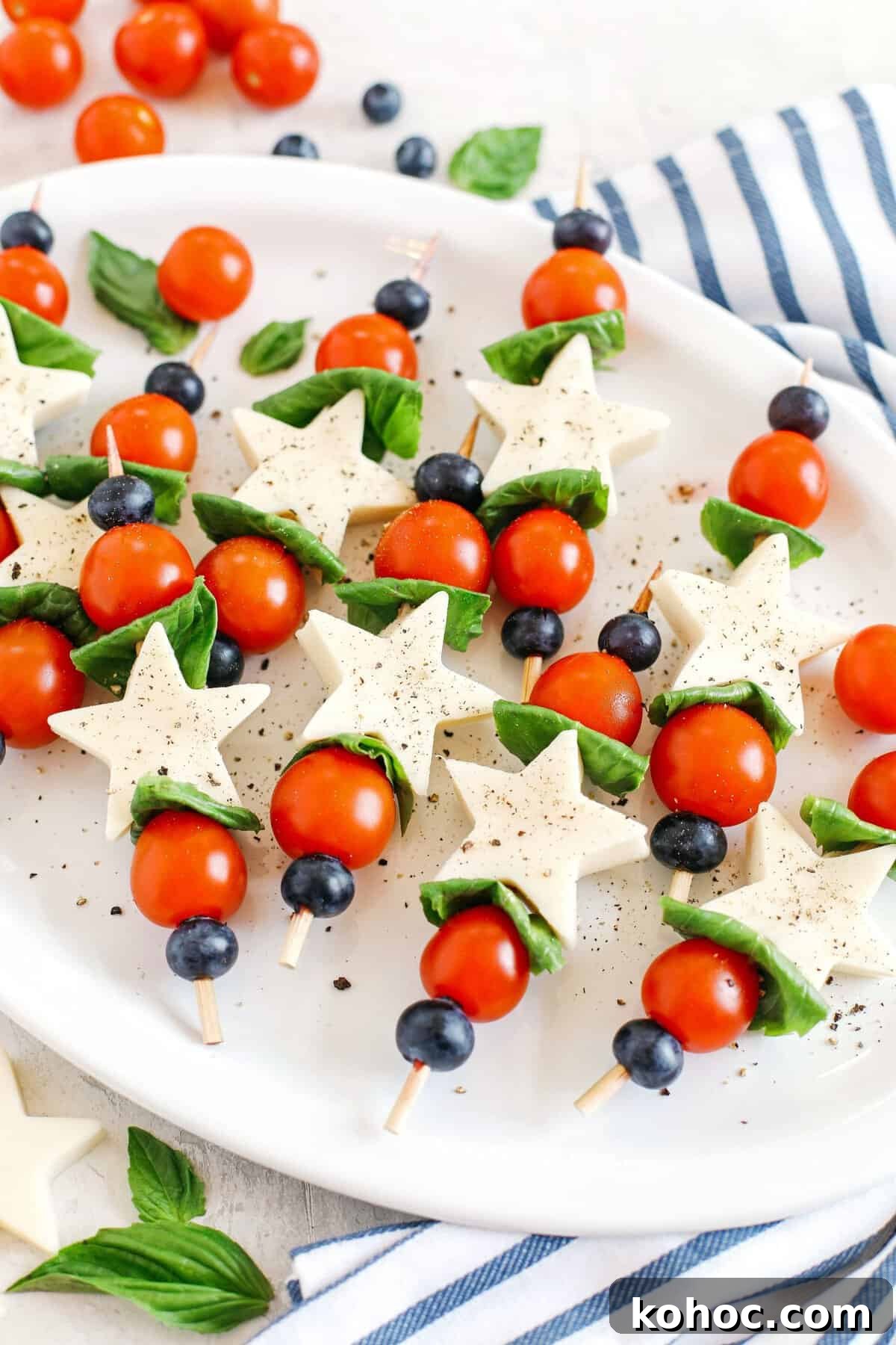 Blueberry Balsamic Glazed Caprese Skewers Recipe 3 Caprese skewers close-up