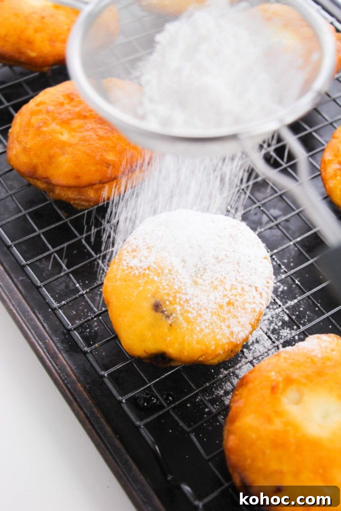 Homemade Nutella-Filled Donuts Recipe 11 Finished donuts on a plate