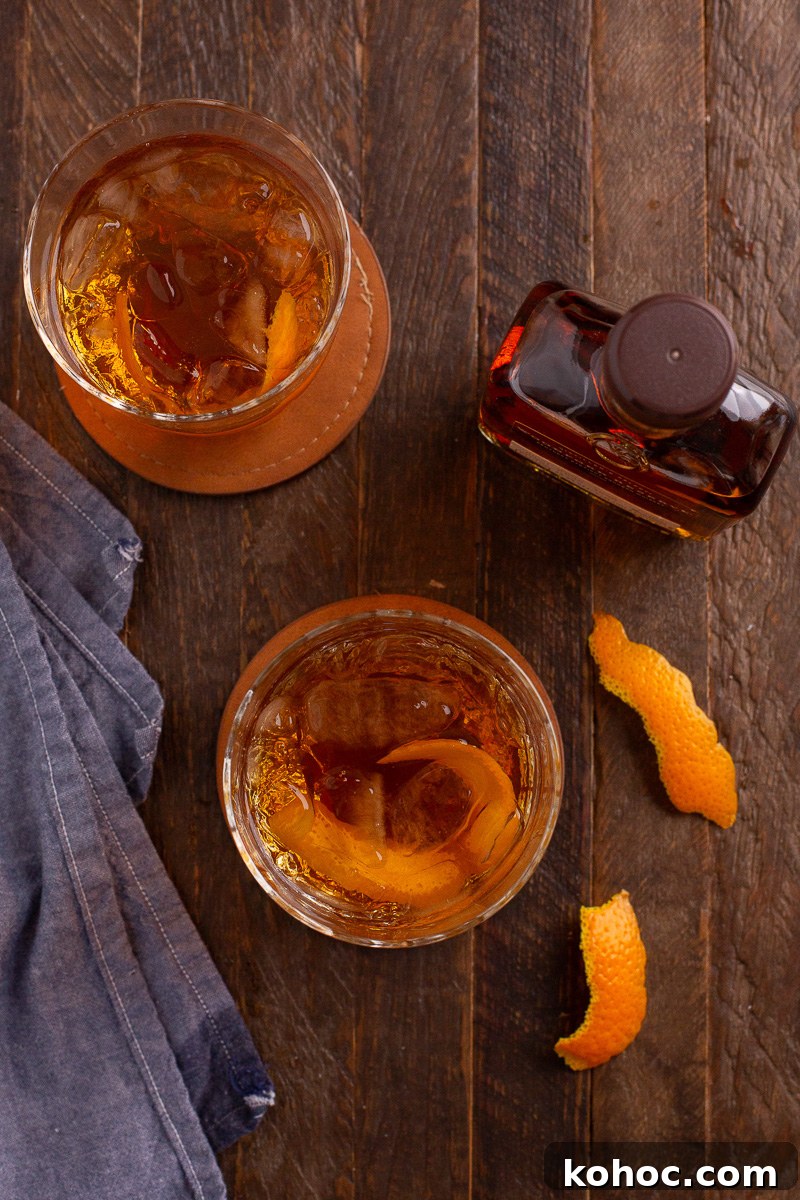 Classic Old Fashioned Cocktail Recipe with Bourbon 5 Overhead view of old fashioned bourbon cocktail in glass.