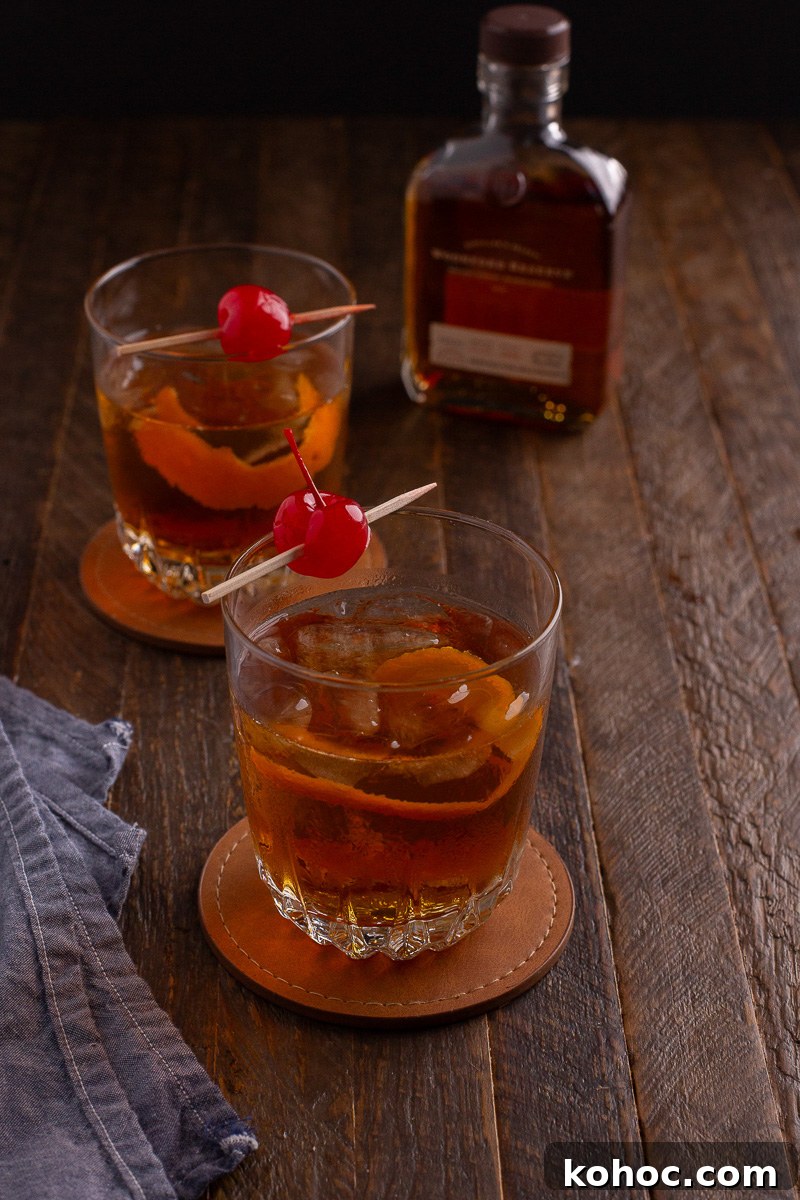 Classic Old Fashioned Cocktail Recipe with Bourbon 8 Side view of old fashioned cocktail.