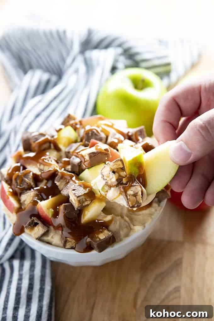 Snickers-Inspired Caramel Apple Dip 2 caramel apple snickers dip served with sliced apple