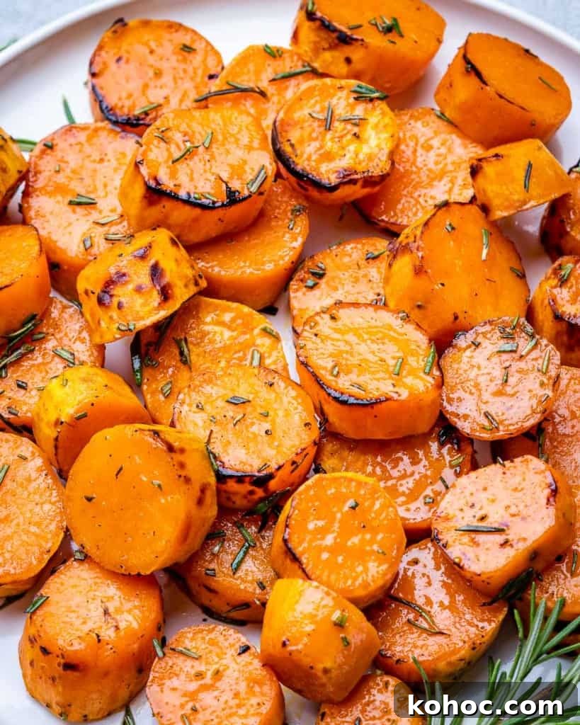 Crispy Roasted Sweet Potatoes with Garlic and Herbs 3 Rounds of roasted sweet potatoes served with fresh rosemary.